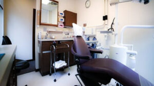 Dental exam room with dental chair.